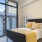a bedroom with a large window