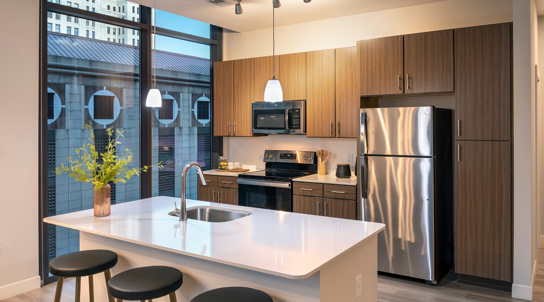 Beautiful kitchens with designer finishes Well-lit kitchen with ample counter space